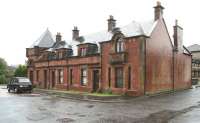 The 1896 main station building at Clydebank Riverside, closed in October 1964. The photograph was taken on 8 June 2010 looking south west during heavy rain. The building has been sympathetically renovated and converted to residential accomodation. The fact that the former station faces onto Cunard Street should give more than a hint as to what once took place along this part of the River Clyde.   <br><br>[John Furnevel 08/06/2010]