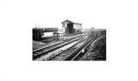 Undated, but British Railways era, view of Holcombe Brook goods shed showing the track layout, conductor rails and the start of the 1:40 descent to Greenmount and Tottington marked by a <I>Pin down brakes</I> notice. [See image 21335] for a picture of a passenger train passing this spot at the end of the passenger platform. Photocourtesy of Bury Historical Society. <br><br>[W A Camwell Collection (Courtesy Mark Bartlett) //]