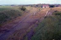 Westcraigs looking east in 1988. I recall thinking 1) why didn't I visit here sooner? 2) if you clean that ballast up you could just about re-open the line (yeah right). Still, 22 years later ... [see image 29581].<br><br>[Ewan Crawford //1988]