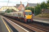 334 009 passes through Uddingston in June 2010.<br><br>[John Steven /06/2010]