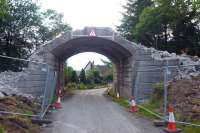 Demolition of the bridge that was intended to carry a direct line chord from Oban to Ballachulish at Connel Ferry on 29 June 2010. [See image 29610]<br><br>[Colin Miller 29/06/2010]