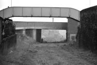 Looking north east towards Dalry Junction along the trackbed of the Caledonian route to Princes Street in 1972. Dalry Road shed stood to the left beyond the road bridge carrying Dundee Street, with Dalry Road station and the Junction itself a little further on. [See image 29620] <br><br>[Bill Jamieson //1972]