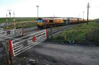 Coal train awaits departure from Cwm Bargoed. The line runs south through a (today) surprisingly rural valley until Bedlinog. The Cwm Bargoed loading pad is the only use of the line the whole way from Ystrad Mynach. View looks west.<br><br>[Ewan Crawford 11/06/2010]
