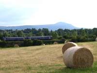 The 1526 ex-Ladybank heads for Perth past fields near the Fife village of Collessie in the summer of 2010.<br><br>[Brian Forbes /06/2010]