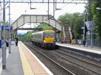 Arrival at Anniesland - 334 030, destination Dalmuir, pulls in on 15 June 2010<br><br>[David Panton 15/06/2010]