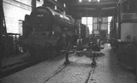 Carlisle Upperby Royal Scot no 46118 <I>Royal Welch Fusilier</I> stands alongside a Derby/Sulzer Type 2 in the fitting shop at Perth  in November 1963.<br><br>[K A Gray 23/11/1963]