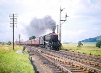 Black 5 no 45311 about to run south through Symington with a 13-coach <I>CTAC Scottish Tours Express</I> on Saturday 1 August 1959. (CTAC = Creative Tourist Agencies Conference)<br><br>[A Snapper (Courtesy Bruce McCartney) 01/08/1959]