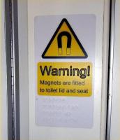 A puzzling warning notice in a toilet cubicle of a Class 170 on 19 June 2010. As to what the danger might be I'll have to leave to your imagination. <br>
<br><br>[David Panton 19/06/2010]