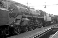 BR Standard class 4 4-6-0 no 75029 on shed at Stoke-on-Trent in 1965. The locomotive was withdrawn from here in August 1967 and has been preserved, although on last sighting it wasn't loooking too well [see image 28429].<br><br>[Robin Barbour Collection (Courtesy Bruce McCartney) //1965]