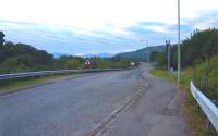 Looking north at the location of North Connel Halt on 29 June 2010 along the former trackbed. The old road can be seen descending on the right of the photograph. [See image 22767 for a view from the old road twenty-three years earlier]. <br>
<br><br>[Colin Miller 29/06/2010]