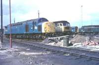 EE Class 40 No. 201, and Brush Class 47 No. 1646, at Newton Heath shed alongside an 08 shunter and another Class 40 in green livery. Nowadays this depot exclusively services DMUs, and has a large allocation of various classes, but in the late 1960s and 1970s significant numbers of Classes 25, 40 and 47 could be seen in between passenger and freight turns. [See image 8575]<br><br>[Mark Bartlett //1972]