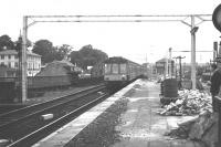 A Glasgow bound DMU off the Ayr line runs into Platform 2 at Paisley Gilmour Street in June 1966. Stoneybrae signal box stands in the background.<br><br>[Colin Miller /06/1966]