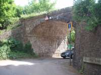 The short Brixham branch in South Devon closed in 1963 and very little infrastructure remains, this substantial bridge on the outskirts of the town being a notable exception. The line, laid originally in broad gauge, started from a short bay platform at Churston station, which until the branch opened was known as Brixham Road.<br><br>[Mark Bartlett 14/06/2010]