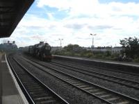6024 <i>King Edward I</i> passes Leamington Spa at the head of  'The Royal Oak' steam charter from London Paddington to  Worcester Shrub Hill. The couple on the platform bench look decidedly uninterested!<br>
<br><br>[Michael Gibb 10/07/2010]