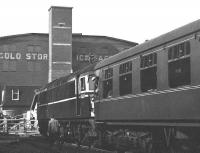 Scene at South Leith on 27 March 1967 showing D5317 with <I>Scottish Rambler No 6</I>. The view is west, with a siding continuing beyond the level crossing over Constitution Street to serve warehouses along Tower Street. The large building opposite, on the corner of Constitution Street and Tower Street, is the North British Cold Storage & Ice Co Ltd.</I> [See image 11374] for the view from the factory site towards the station forty years later.<br><br>[Bruce McCartney 27/03/1967]