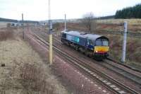 A locomotive heads north after a pause in the loop at Beattock Summit.<br><br>[Ewan Crawford 02/09/2008]