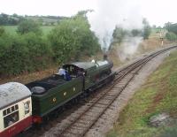 Superbly restored, ex-Barry, GWR 2-8-0 3803 departs from Winchcombe for Gotherington where G&WR services are presently terminating as there is subsidence between there and Cheltenham.<br><br>[Mark Bartlett 17/07/2010]