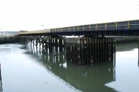 The damaged railway bridge in Workington Harbour viewed from the south bank. [See image 11537]<br><br>[Ewan Crawford /02/2010]