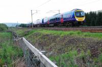 Northbound Manchester Airport - Glasgow service approaching Elvanfoot on 5 June 2010.<br><br>[Ewan Crawford 05/06/2010]