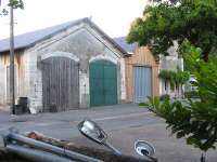 The former two road engine shed and associated offices survive at Ligueil, seen here on 14 July with a new addition in between.  They are now in use as a municipal depot.  The station site itself is now a public park.<br><br>[Mark Poustie 14/07/2010]
