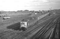 Deltic 9014 <I>The Duke of Wellington's Regiment</I> approaches Portobello East signalbox with the down <I>Flying Scotsman</I> on 25 February 1970.<br><br>[Bill Jamieson 25/02/1970]