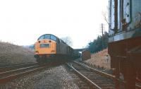A class 40 heads south past Kelso Junction with a Millerhill - Kingmoor freight in March 1968, while the local pickup from Kelso waits to join the main line and head north.<br><br>[Bruce McCartney /03/1968]