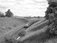 A Brush Type 4 with a southbound passenger train near Braidwood on Glasgow Fair Saturday 1966.<br><br>[Colin Miller //1966]