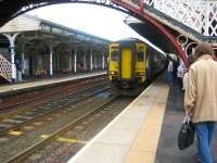 The 1027 service to Newcastle Central (0800 ex Glasgow Central) arrives at Hexham on 21 July 2010 <br>
<br><br>[Bruce McCartney 21/07/2010]