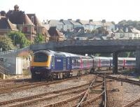 A FGW Penzance to Paddington service, with power car 43170 bringing up the rear, snakes out of Plymouth station heading east on 15 June 2010. The HST will shortly pass Laira depot, where these trains are serviced and repaired.<br><br>[Mark Bartlett 15/06/2010]