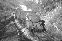 A Glasgow-Oban train climbs through the Pass of Leny, north of Callander, in 1957 headed by Black 5 No. 44954.<br><br>[Frank Spaven Collection (Courtesy David Spaven) //1957]