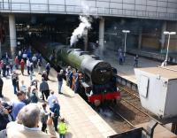 46115 <I>Scots Guardsman</I> receives attention from the support <br>
crew as it waits at Manchester Victoria with <I>The Cotton Mill Express</I> on 17 July 2010, having completed the first circuit of the Standedge route. Unfortunately the locomotive was not permitted to proceed with the second circuit due to a leaking gland but did take the train up Miles Platting bank ecs to Castleton where repairs were completed. It then returned the train to Carnforth later in the evening. <br>
<br><br>[John McIntyre 17/07/2010]