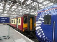 No longer a common sight, given SPT livery is now almost extinct on the Class 156 fleet. Unit 156504 stands at Glasgow Central on 24 July 2010, having arrived on the 0956 ex-Edinburgh Waverley.<br><br>[John Yellowlees 24/07/2010]