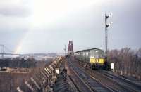 Rainbow's end. A Waverley bound DMU approaching the platforms of Dalmeny station from the Forth Bridge in 1964.<br><br>[Frank Spaven Collection (Courtesy David Spaven) //1964]
