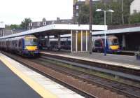 Westbound trains on the Fife and Glasgow lines occupy platforms 2 and 4 at Haymarket on 26 July. <br><br>[Andrew Wilson 26/07/2010]