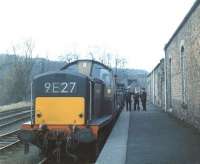 The last freight to visit Penicuik [closed to passengers in September 1951]. D8561 photographed at the platform of the Midlothian terminus during the early days of April 1967. In the background is the short tunnel under the A701 that once provided a rail link to Bank Mill [see image 34469]. <br><br>[Jim Peebles /04/1967]