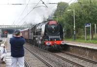 6233 with the return <I>Cumbrian Mountain Express</I> from Carlisle to Liverpool accelerates through Leyland on the up fast line on 24 July following a signal check. The holdup was caused by a late running northbound Trans Pennine Express from Manchester Airport which had joined the WCML at Euxton Junction.<br><br>[John McIntyre 24/07/2010]