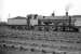 G2 0-8-0 no 49454 photographed at Speke Junction (8C) in September 1958 having probably worked into the area on a freight from its home depot of Crewe South. Speke Junction closed to steam in May 1968 and the old 12 road straight shed is long demolished. Sidings still remain on part of the site which is now bordered on the south side by the large <I>New Mersey</I> shopping complex.<br><br>[Robin Barbour Collection (Courtesy Bruce McCartney) 26/09/1958]