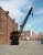 The old warehouses at Gloucester Docks are now used by businesses, retail outlets and the local authority. Behind the North Warehouse is a short length of the old dock railway and this preserved Joseph Booth rail mounted steam crane, built at Leeds in 1944, and with a seven and a half ton lifting capacity.  <br><br>[Mark Bartlett 11/06/2010]