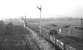 D8120 approaches Niddrie West Junction with an unfitted freight from Millerhill, (possibly the 14.56 to Mossend) on 4 February 1970. Beyond and to the right of the signal box is the embankment that carried a section of the original 1835 Edinburgh & Dalkeith Railway route towards Leith (closed in 1859).<br>
<br><br>[Bill Jamieson 04/02/1970]