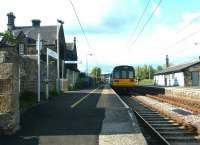 The (one and only) evening Metro Centre - Chathill train calls at Acklington on 24 May 2004.<br><br>[John Furnevel 24/05/2004]