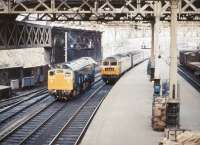 A Brush type 4 arriving at Waverley with the down <I>Aberdonian</I> in 1975 meets a gleaming type 2 standing at the east end of the station.<br><br>[John Furnevel 25/05/1975]