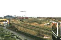 A desolate Leith South yard in December 2004. Part of the sloping roof of Leith South goods depot can be seen on the extreme left of the picture above the filling station [see image 11661]. <br><br>[John Furnevel /12/2004]