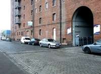 Track running across Anderson Place in April 2004 into what was once a large bonded warehouse (now converted flats). Just one of a number of locations in the area once rail-served via the goods link from the North Leith branch east of Bonnington station.<br><br>[John Furnevel 26/04/2004]