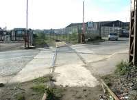 Looking back from the entrance to the docks across Albert Road to Leith South yard, April 2004.<br><br>[John Furnevel 28/04/2004]