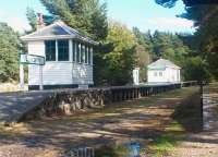 The former Knockando station in September 2004 looking towards Aberlour. Originally opened as Dabeallie in 1899, the change to Knockando took place in 1905 and lasted until closure in 1965. The restored station now carries the nameboard <I>Tamdhu</I> in deference to the local distillery which now owns the site.<br><br>[John Furnevel 12/09/2004]