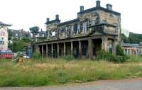 The once grand 1847 Burntisland terminus of the former Edinburgh & Northern Railway that once formed a key part of the rail and ferry route between Edinburgh and Dundee. Ferries from here linked with the Edinburgh, Leith and Newhaven Railway at Granton, which in turn provided a rail connection to the centre of Edinburgh at Canal Street (now Waverley) while at the northern end of the route the Tayport - Broughty Ferry crossing provided a connection with the Dundee and Arbroath Railway. The station became redundant on the opening of the Forth Bridge when a new through station was built just to the west on a new alignment. Photographed in July 2002.<br><br>[John Furnevel 30/07/2002]