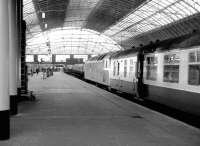 A class 47 with an arrival at Glasgow Queen Street in August 1981<br><br>[John Furnevel 02/08/1981]