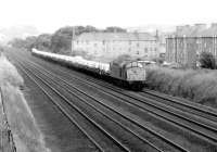 40049 approaching Saughton junction in July 1981 with a car train heading for Bathgate.<br><br>[John Furnevel 15/07/1981]