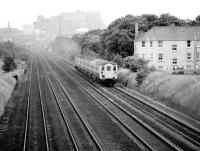 A DBSO leads a hard working class 47 towards Saughton Junction in May 1982 with an Edinburgh - Glasgow push-pull set.<br><br>[John Furnevel 19/05/1982]