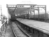 View towards the buffer stops from alongside Stranraer Harbour station in October 1972 with a train for Glasgow Central at the platform.<br><br>[John Furnevel 13/10/1972]